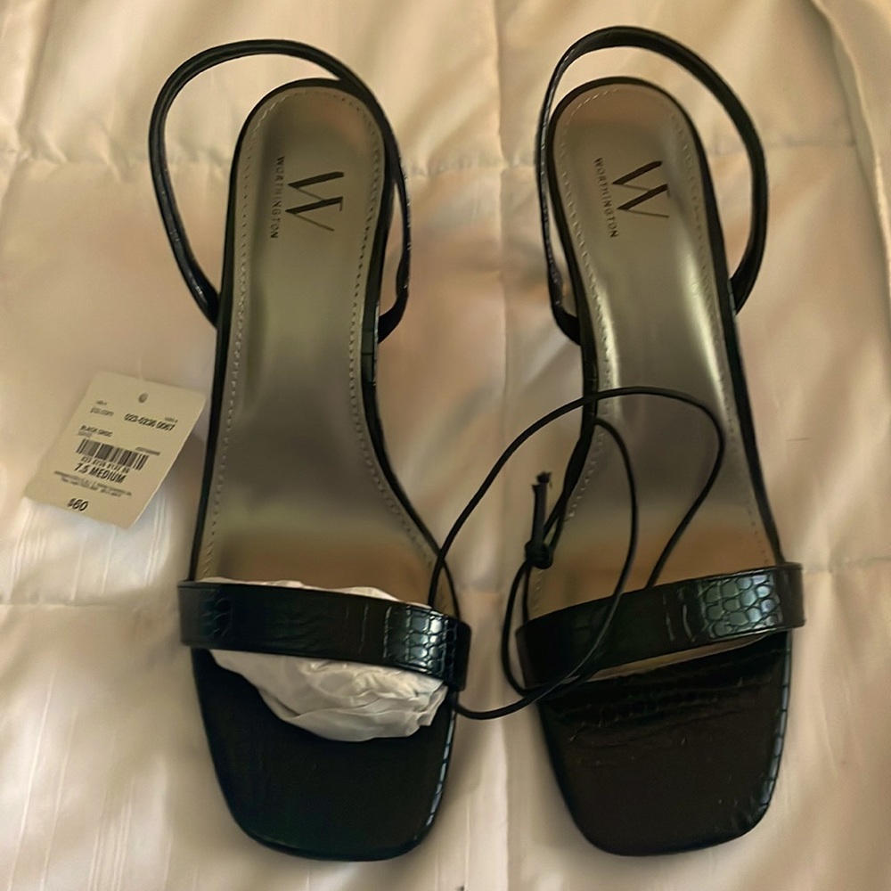 Brand new super cute heeled sandal.